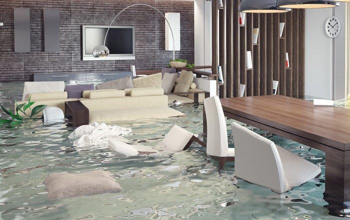 Flooded basement covering couch and chairs